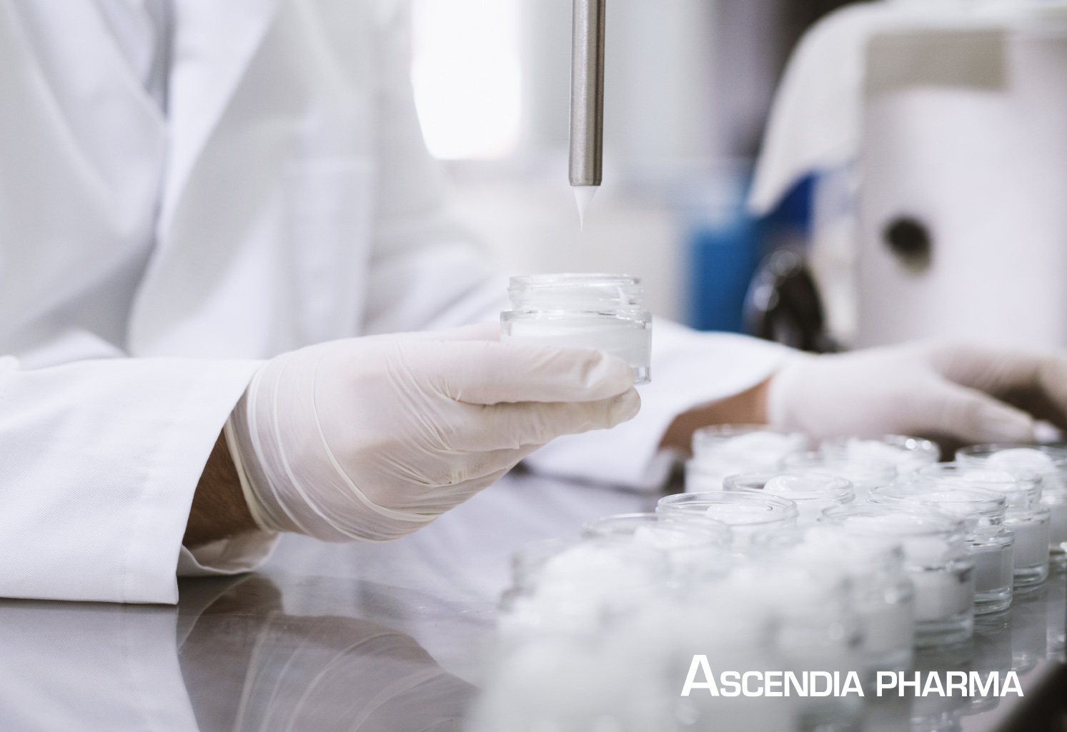 A scientist testing semi-solid and semi-liquid dosage forms in a laboratory